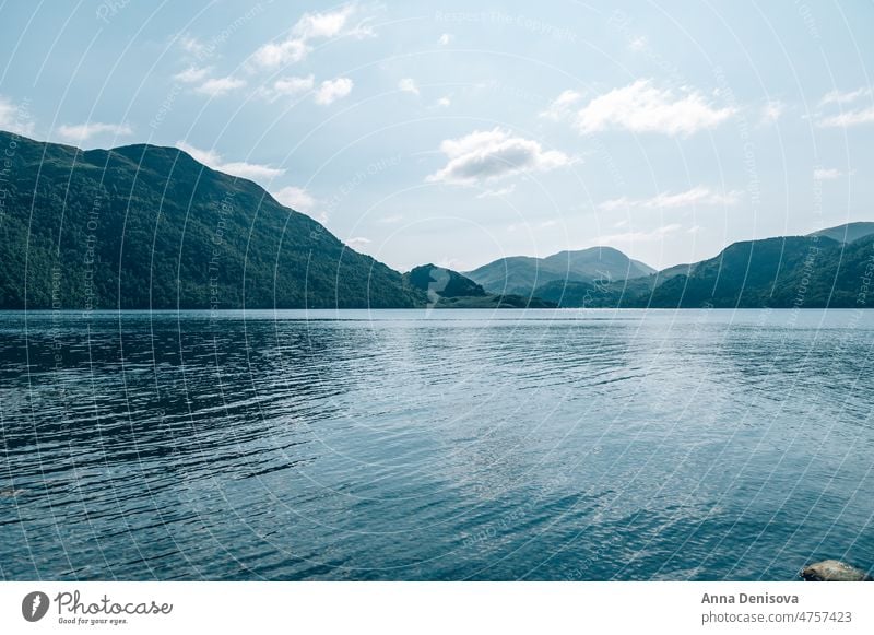 Ullswater Lake landscape, UK ullswater lake district cumbria mountains nature outdoor sky tourism travel reflections scenic panorama blue scenery calm hills