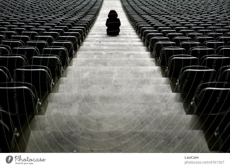 Ghost game II - a lonely figure still sitting on the stairs of an empty stadium chairs Stairs stagger shape person Lonely depression on one's own sad Eerie