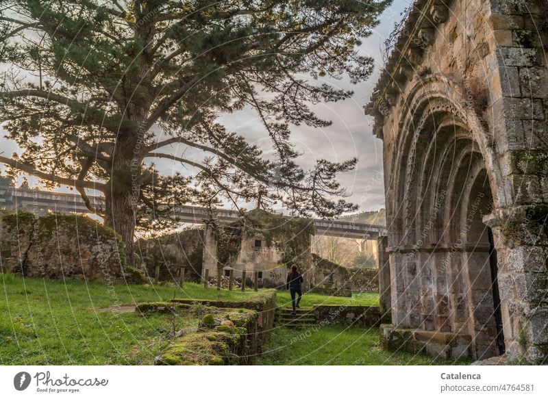 Round arch of the chapel of an abandoned monastery, in the background a highway bridge Change forsake sb./sth. Structures and shapes Pattern Environment Nature