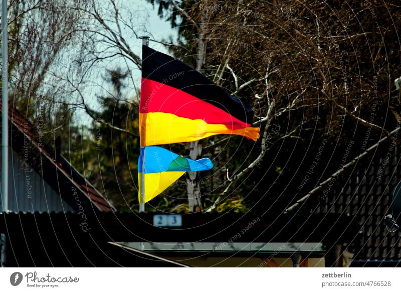 German above, Ukrainian below Germany Flag emblem nation Nationality Solidarity city district street photography Scene scenery daily life Ukraine urban Suburb