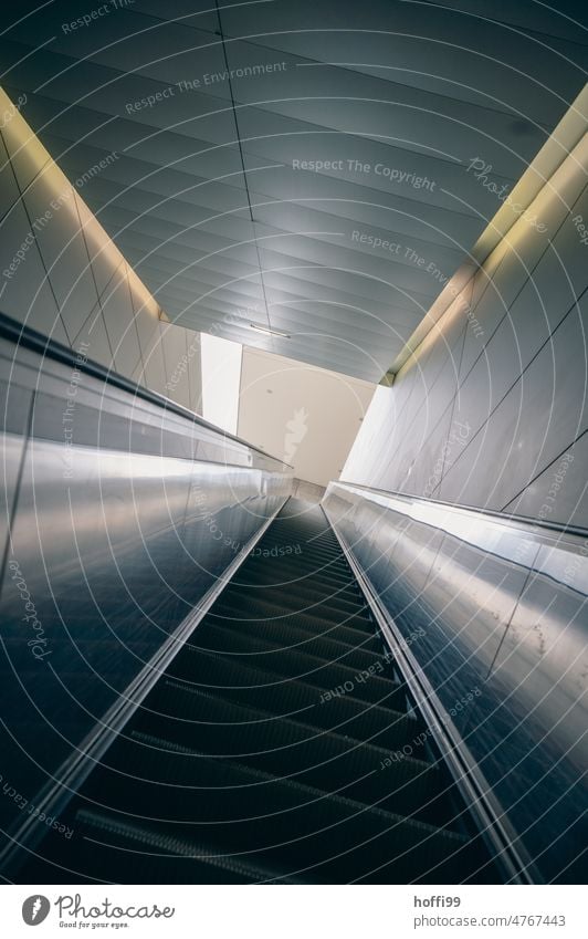 Escalator from the underground up to the light Subway boot Upward toward the light Light at the end of the tunnel Architecture Bright Shadow Tunnel Corridor