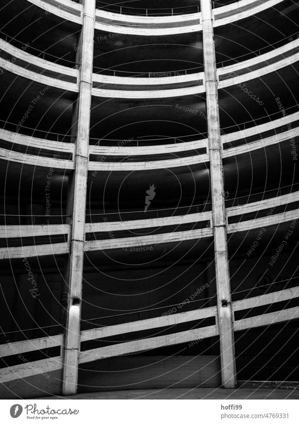 Partial view of a driveway / exit inside a parking garage Parking garage Ramp Circle Concentric Architecture Highway ramp (entrance) Highway ramp (exit) circles