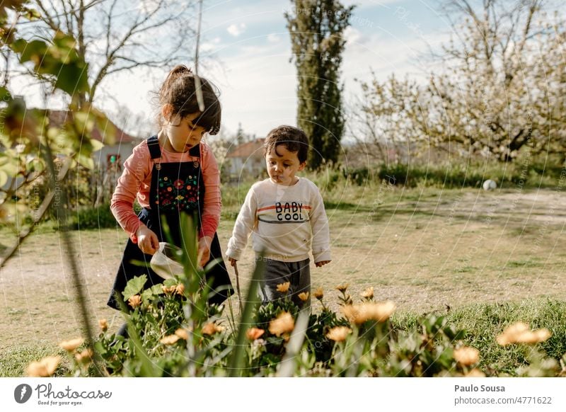 Brother and sister playing with water Together Brothers and sisters Family & Relations Child childhood Children's game Leisure and hobbies Caucasian Human being