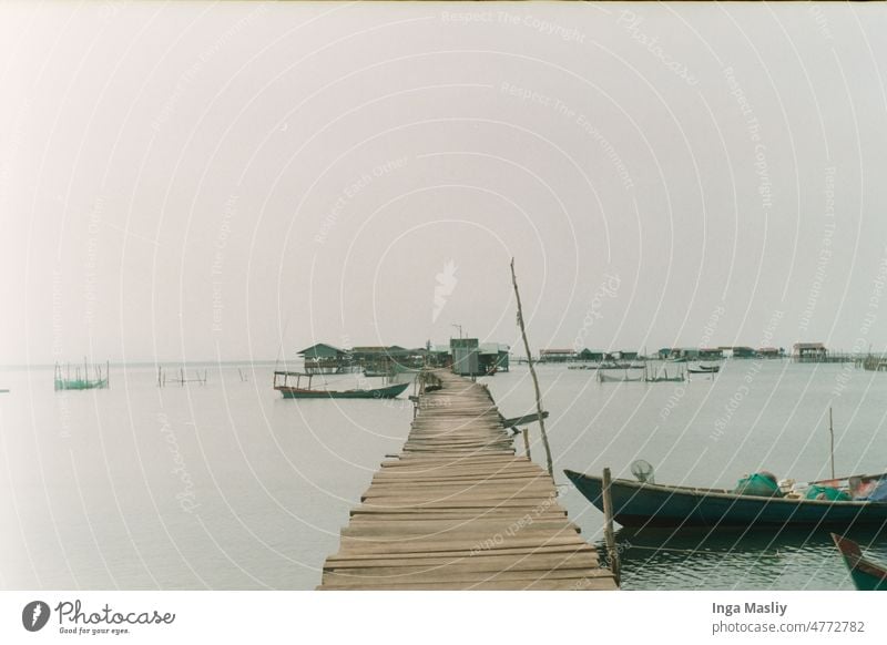 Vietnam Pier Vietnamese SEA Port City pier boats docked South East Asia film photography