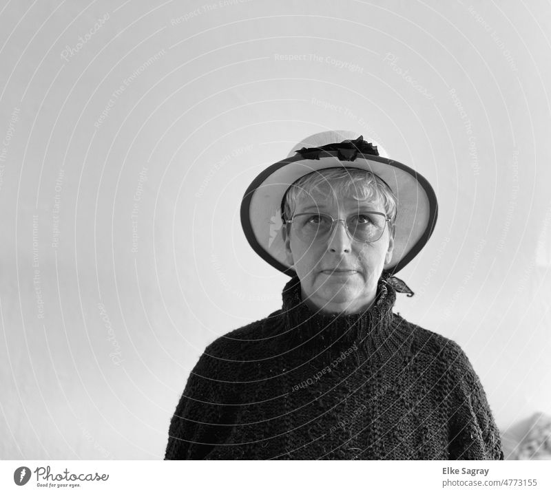 With hat is man.... Woman Feminine Face Hair and hairstyles Looking Upward portrait Interior shot pretty Adults