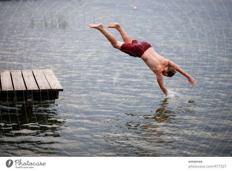 Reaching into the lake Lifestyle Style Joy Swimming & Bathing Leisure and hobbies Vacation & Travel Freedom Summer Beach Human being Masculine Boy (child)