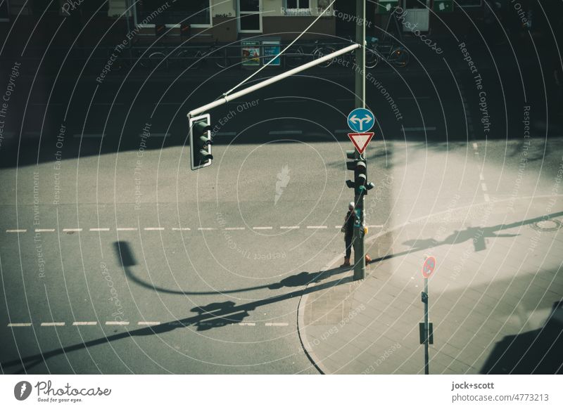 Traffic route and traffic light in Neukölln with shadow play Street Traffic infrastructure Traffic light Bird's-eye view Road sign Shadow Lane markings Sunlight