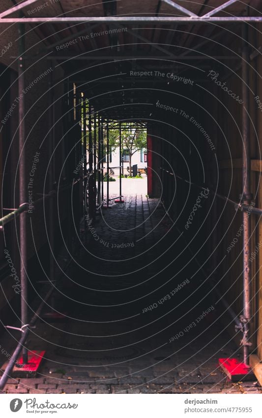 Attention construction site. Enter the passage at your own risk. Construction site Architecture Exterior shot Build Colour photo Facade Scaffold Deserted