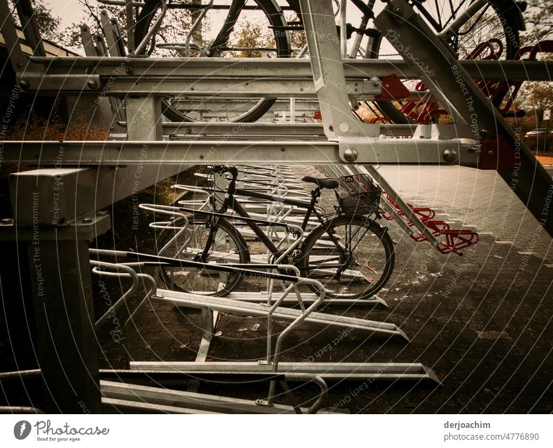 Exemplary parking space bike racks, ground level and high patio. Ideal for parking and sustainable. Bicycle Contrast Town Architecture locked Parking Deserted