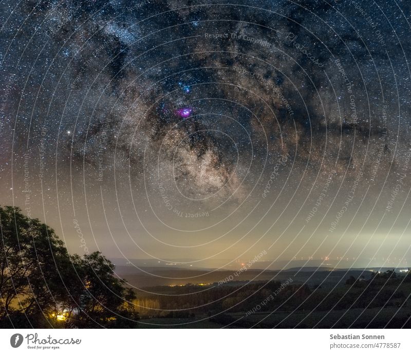 Beautiful core of milky way over rural landscape with fields and meadows full of trees Night Sky Silhouette Landscape Galaxy Stars Nature Astronomy