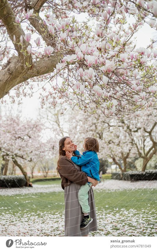 Young woman with small child in her arms Motherhood Mother's Day Infancy people Family & Relations Child Parents Feeling of togetherness maternity Together