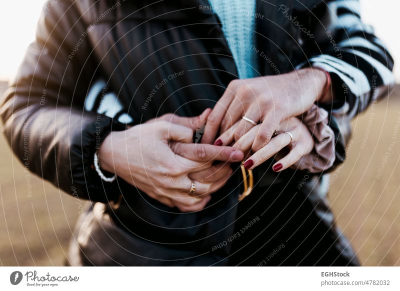 Couple hugging And holding hands with engagement rings couple girlfriend boyfriend wedding person togetherness adult woman bonding embracing finger horizontal