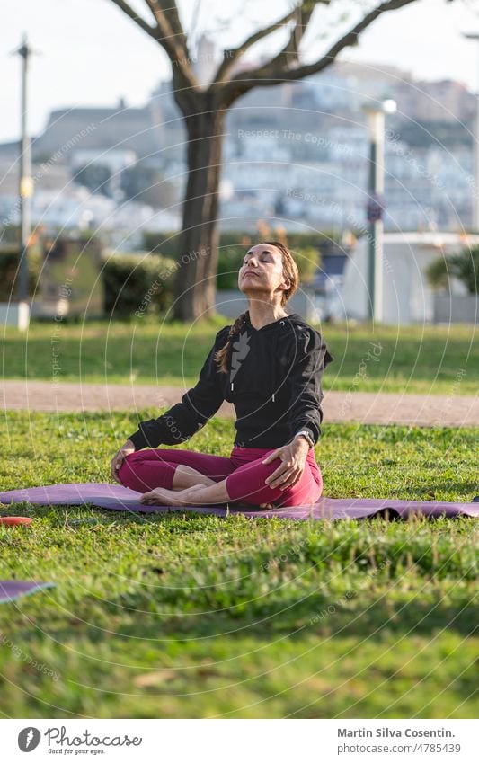 Yoga teacher teaching outdoor classes in Ibiza balance beach beautiful beauty body calm energy exercise female fit fitness girl harmony health healthy landscape