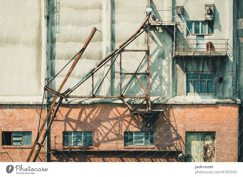 The ravages of time continue to gnaw away at the grain silo Storehouse Facade Weathered Ravages of time Past Historic Depot Construction logistics Trade