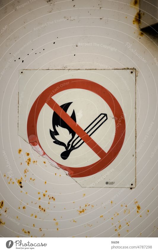 Fire Sign symbol Colour photo Exterior shot Deserted Fire hazard Flame Blaze Burn Dangerous Prohibition sign Threat Ignite Match Kindle match head kindling