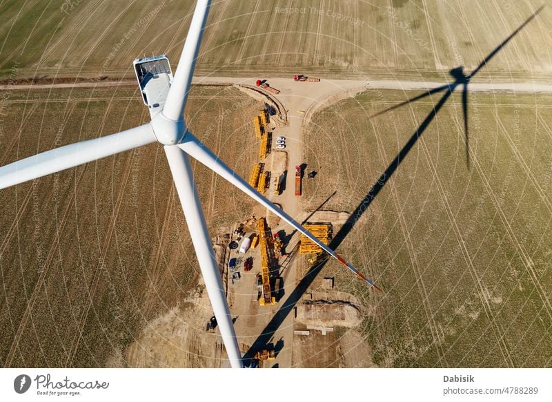 Construction site near windmill turbine, Wind generator installing energy maintenance assembling wind turbine renewable sustainable power innovation build