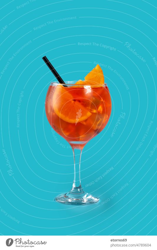 Glass of aperol spritz cocktail alcohol beverage blue cold drink fruit glass ice italian mix orange prosecco refreshment soda summer wine SU2022CFCVP