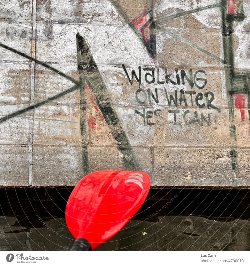 Miracles do happen: Walking on Water Yes I can! Wonder Wishful thinking Water strider walking water Paddle Paddling Red Going Wall (building) Graffiti writing