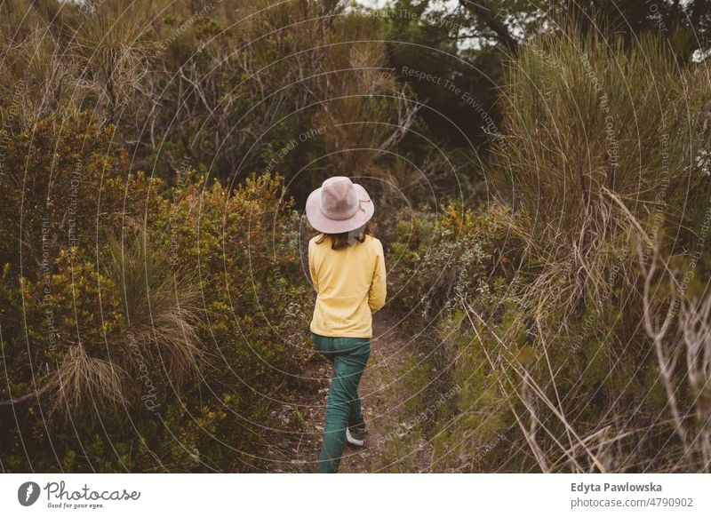 Little girl on a trek in nature activity discovery hiking explore adventure active leisure exploring hike tourist landscape view tourism countryside travel