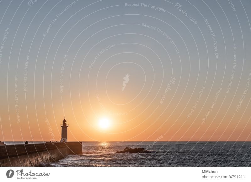 Foz de Douro lighthouse at sunset Lighthouse coast Ocean Sun Sunset Footbridge Angler Rock Porto Atlantic Ocean ocean River clear Copy Space top Blue Orange