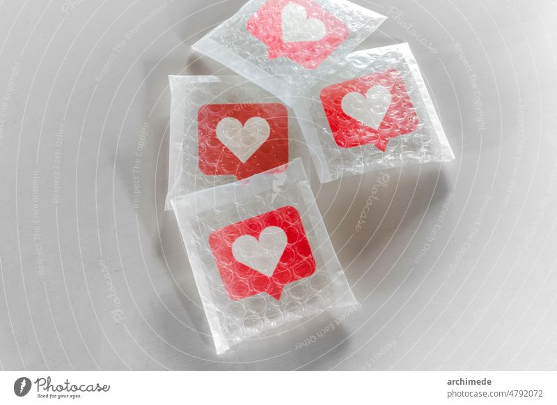 Packaging social Likes icon with bubble wrap audience buy care collection communication community concept conceptual container delivery fragile grow heart