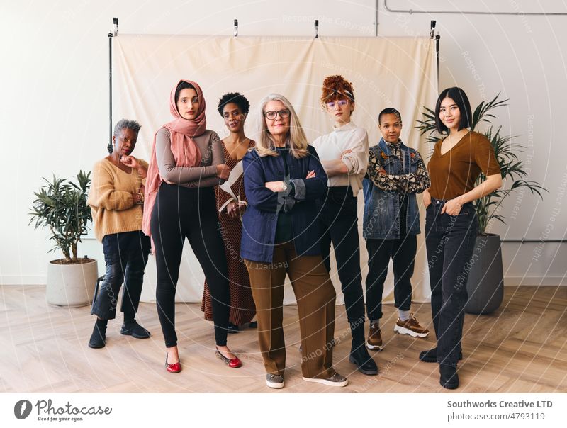 International Women's Day portrait of multi ethnic mixed age range women looking confidently towards camera group international womens day iwd empowerment