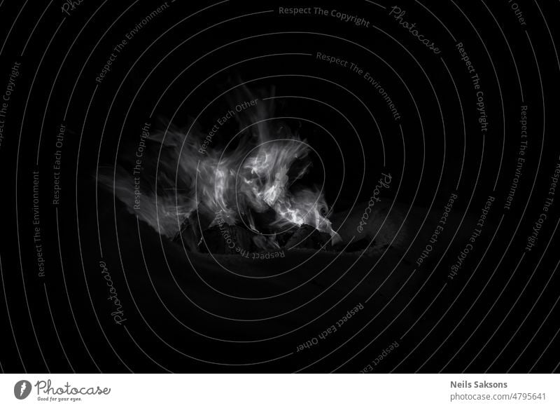 campfire on dark background. Winter. abstract black blaze bonfire bright burn danger energy fiery flame heat hell hot inferno light nature night orange red