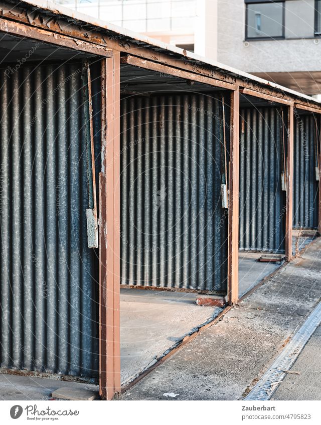 Driveways of garages from corrugated sheet Garage Highway ramp (entrance) Corrugated sheet iron Goal Garage door Row Gloomy Highway ramp (exit) Transport car