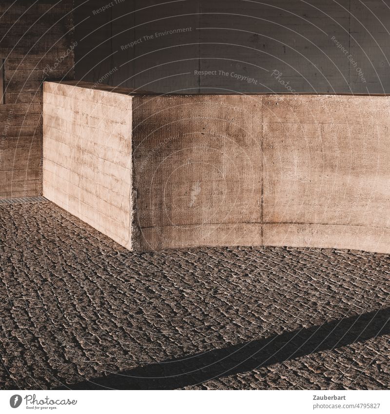 Exposed concrete parapet on paved square and shade exposed concrete Concrete brutalism rail Wall (building) Places Shadow pavement urban Modern Reduced minimal