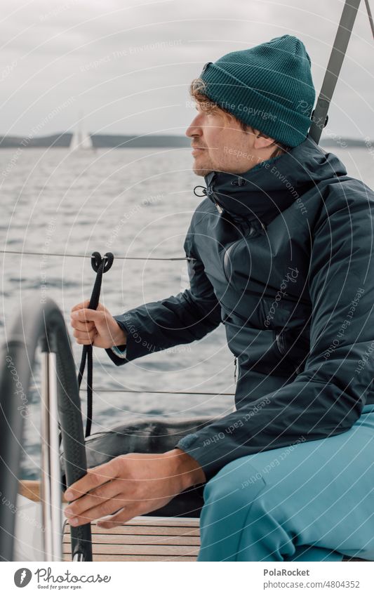 #A0# Man sailing Sailboat Sailing Sailing ship Sailing trip Sailing vacation sailboats Sailing yacht Looking Future confident confidence Ocean coast ocean