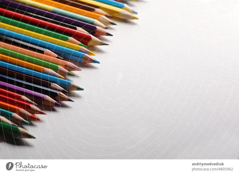 Color pencils set, row wooden color pencils isolated on white background. colored pencils for drawing. copy space up close sharp rainbow group green education