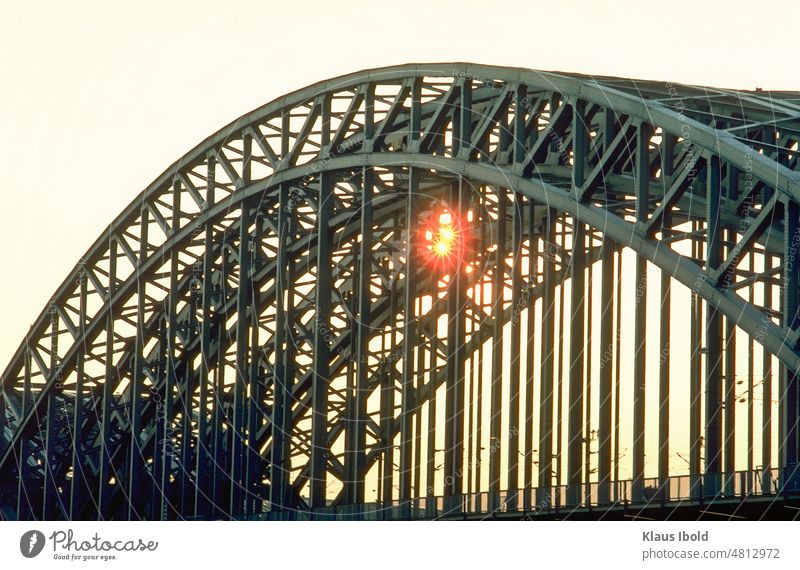 Hohenzollern bridge in Cologne at sunset Germany Hohenzollern Bridge Sunset Sunlight Sunbeam sunshine Evening sun evening sunlight Metal Exterior shot