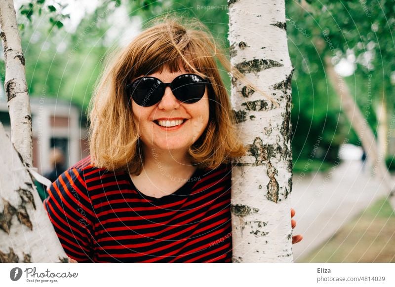 [hansa BER 2022] Nature-loving woman beams with white birch around the bet Woman Birch tree close to nature Tree Tree trunk Tree cuddling feminine Smiling