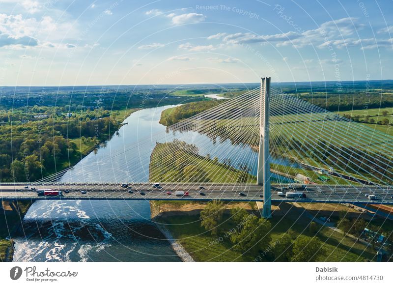 Large bridge over river with cars traffic aerial transport road highway landscape wroclaw redzinski nature bird eye view sky moving driving top city overhead