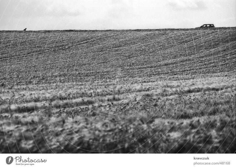 Car seeks owner Field Agriculture Hill Clouds Landscape format Horizontal Loneliness Crooked Grain Sky Black & white photo Floor covering Elevation