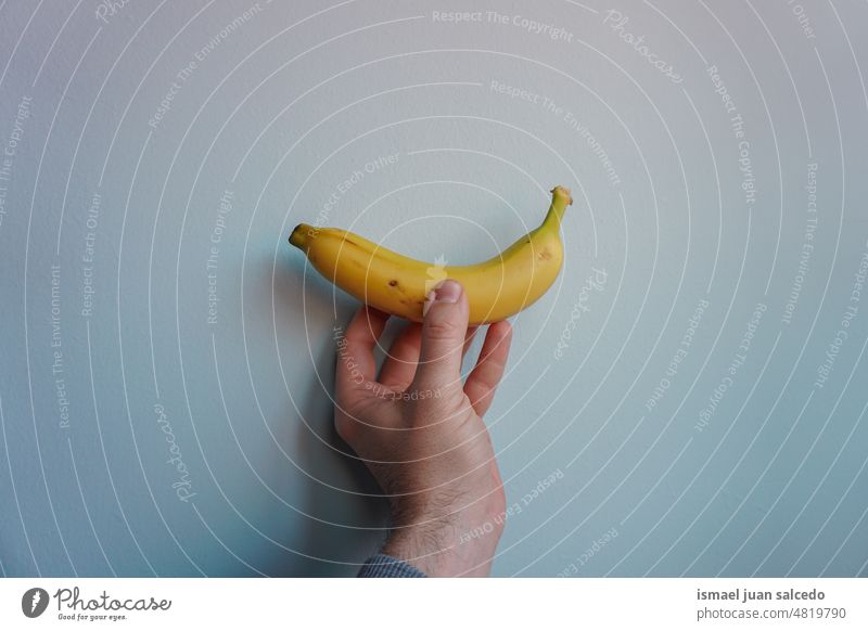 hand holding a banana fruit food food and drink healthy healthy eating healthy food food photography potassium potassium banana vitamin tasty delicious diet