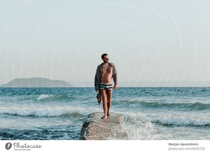 Man enjoying sunset at the beach Khalkidhiki halkidiki Chalkidiki seaside coastline Coast Beach Beach vacation Vacation & Travel Vacation mood travel