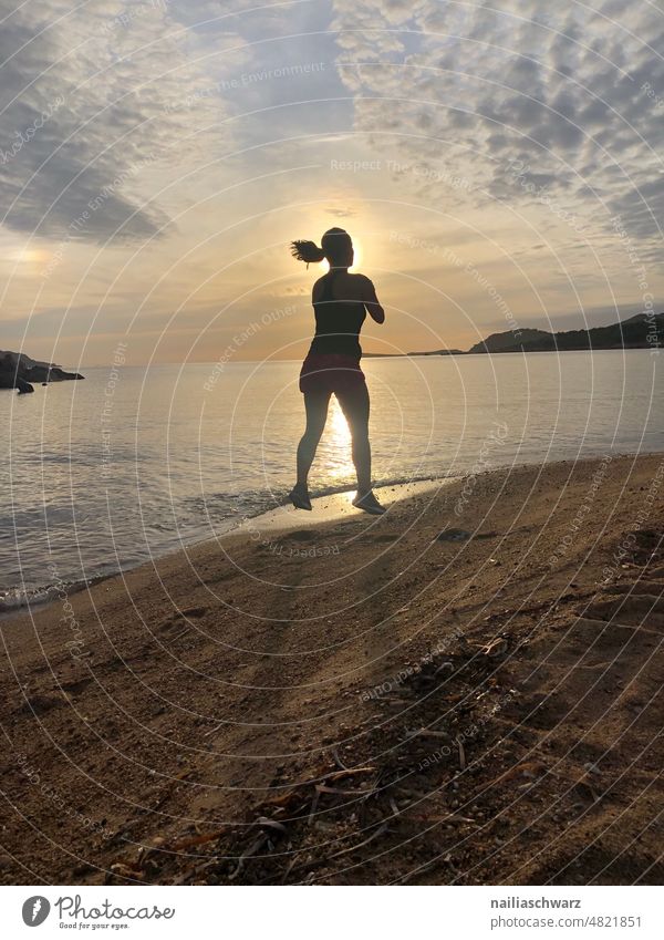 On the beach Sports Athletic Sunlight Back-light Sunbeam Silhouette Feminine Calm Unwavering Colour photo Exterior shot coast Yoga Waves Ocean Beach Meditation