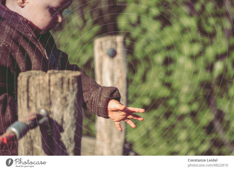 Toddler at playground reaches out his hand. children's hands Parenting Joy Childhood memory Cute Children's game Playing Movement fun play outdoors Happiness