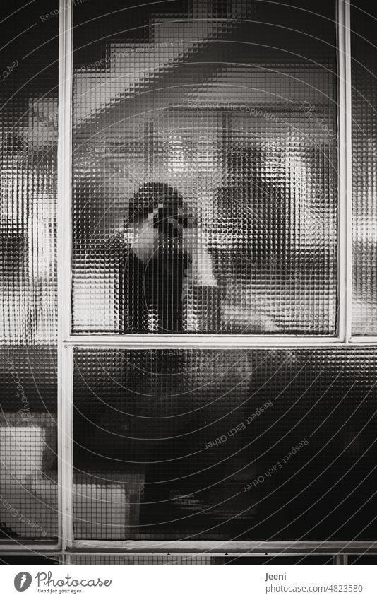 [hansa BER 2022] Man sits in stairwell and talks on phone Sit Staircase (Hallway) black-and-white Telephone To call someone (telephone) make a phone call