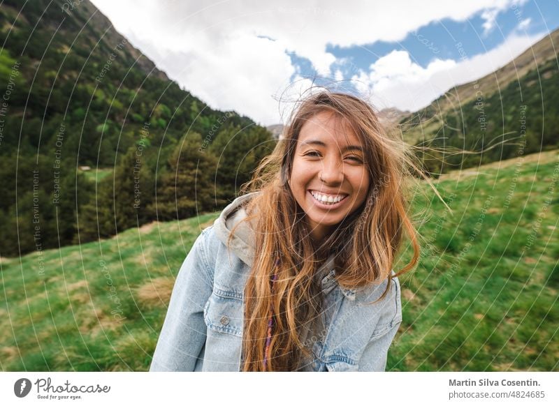 Latin young girl in the mountains of Andorra. active activity adult athlete athletic attractive beautiful beauty bicycle bike brunette cheerful city cyclist