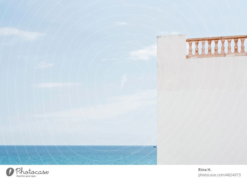 White building wall sea view mediterranean Ocean Part of a building House wall Blue sky rail Roof terrace Mediterranean