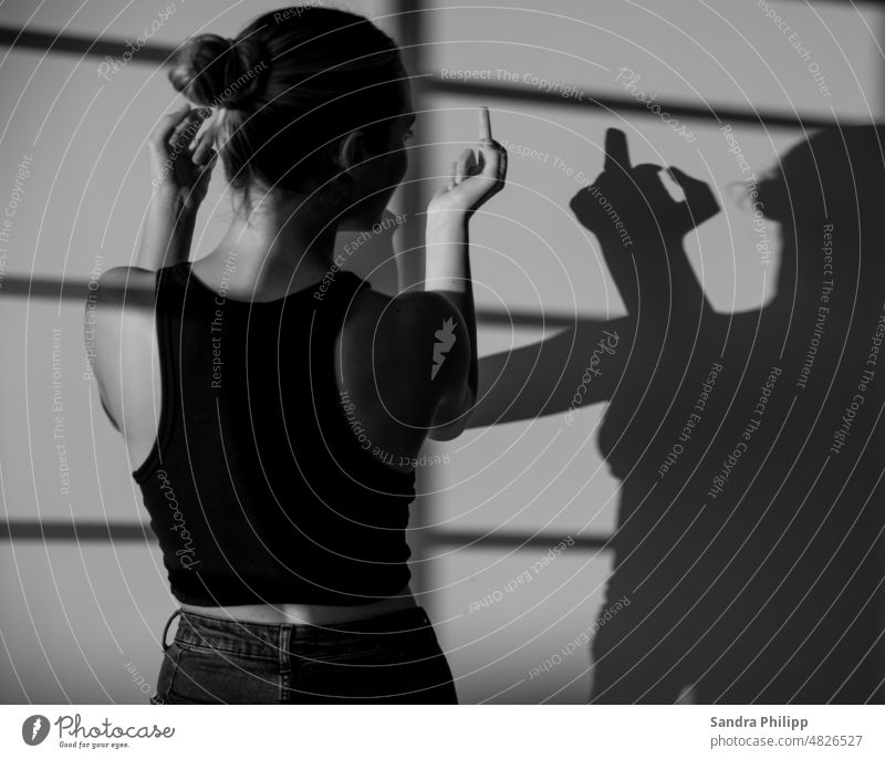 Portrait of a young woman with her shadow portrait Shadow Emotions Young woman Moody naturally 18 - 30 years Esthetic Beauty & Beauty Self-confident pretty