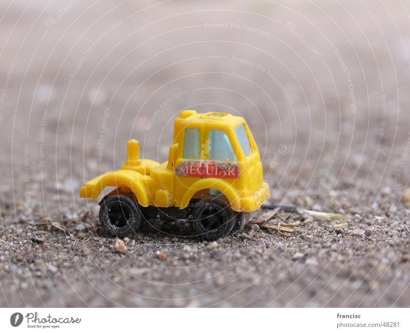 Little Truck Yellow Macro (Extreme close-up) Diffuse Design Vacation & Travel car machine sallow sad sandy little small plaything toy child game wheel blur Art