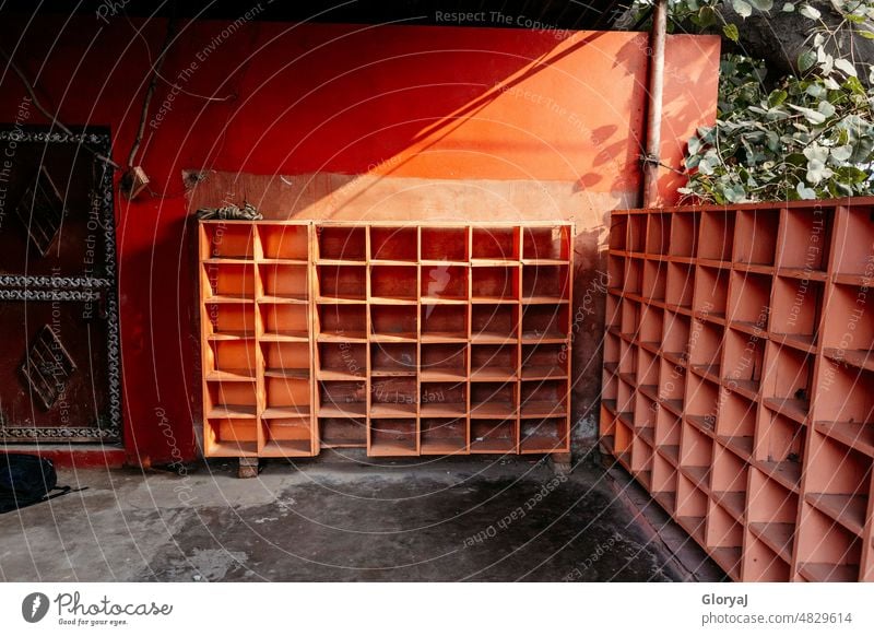 Empty shelves in sunlight Shelves Vacancy Blank space Arrange Deserted Orange Sunlight Exterior shot Colour Guide Colour photo Asia