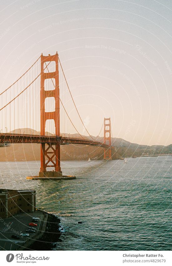 The Golden Gate Bridge at sunset on 35mm film. San Francisco, California. Sunlight Filmlook Tourism Landmark Twilight Light warm Federal elections Tourist Sky