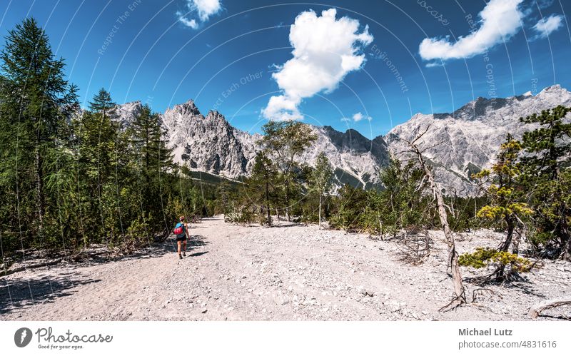 Walking through Wimbachgries valley Berchtesgaden Watzmann afternoon alps bavaria exceeding germany hiking mountaineer people sommer summer wandern