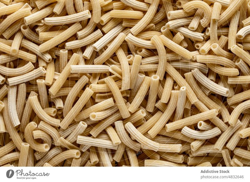 Sedanini rice pasta sedanini wheat raw heap cook mockup many food tradition italian nutrition ingredient meal cuisine dinner lunch dry organic dish uncooked