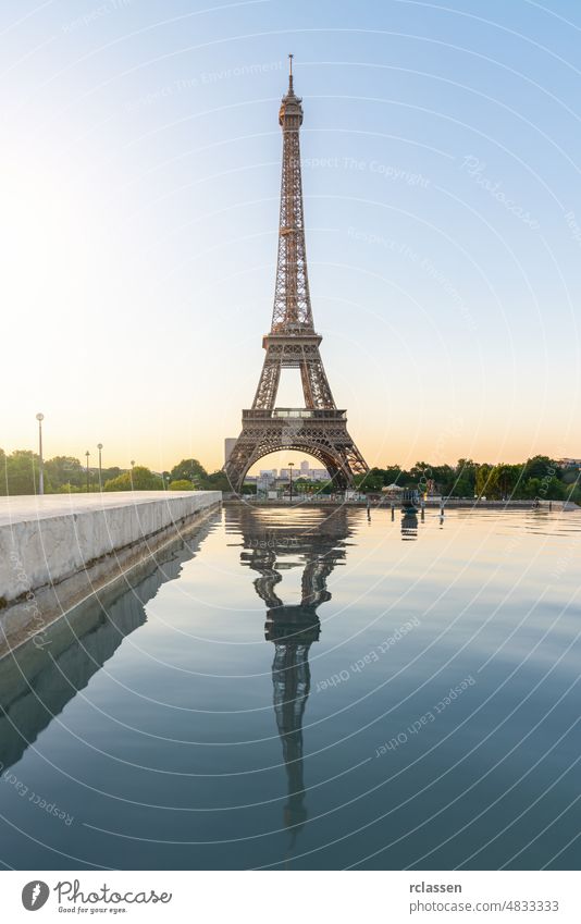 Eiffel Tower, Paris France at sunrise paris eiffel tower sunset landmark france skyline cityscape aerial europe old town defense water summer seine district