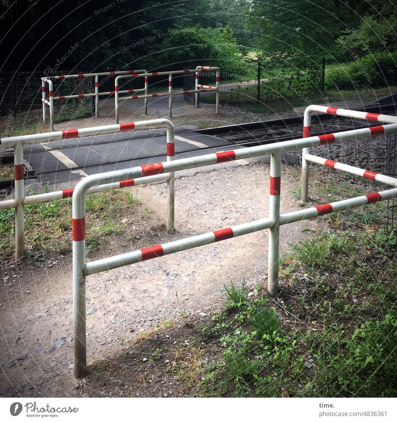 Stories from the fence (120) Crossing Rail transport Barrier Track system Safety Protection gegweg Nature cross Metal Fence lock red and white Warning label